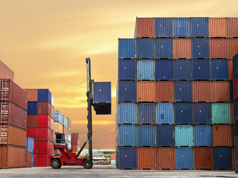 Business Industry Forklift lifting cargo boxes